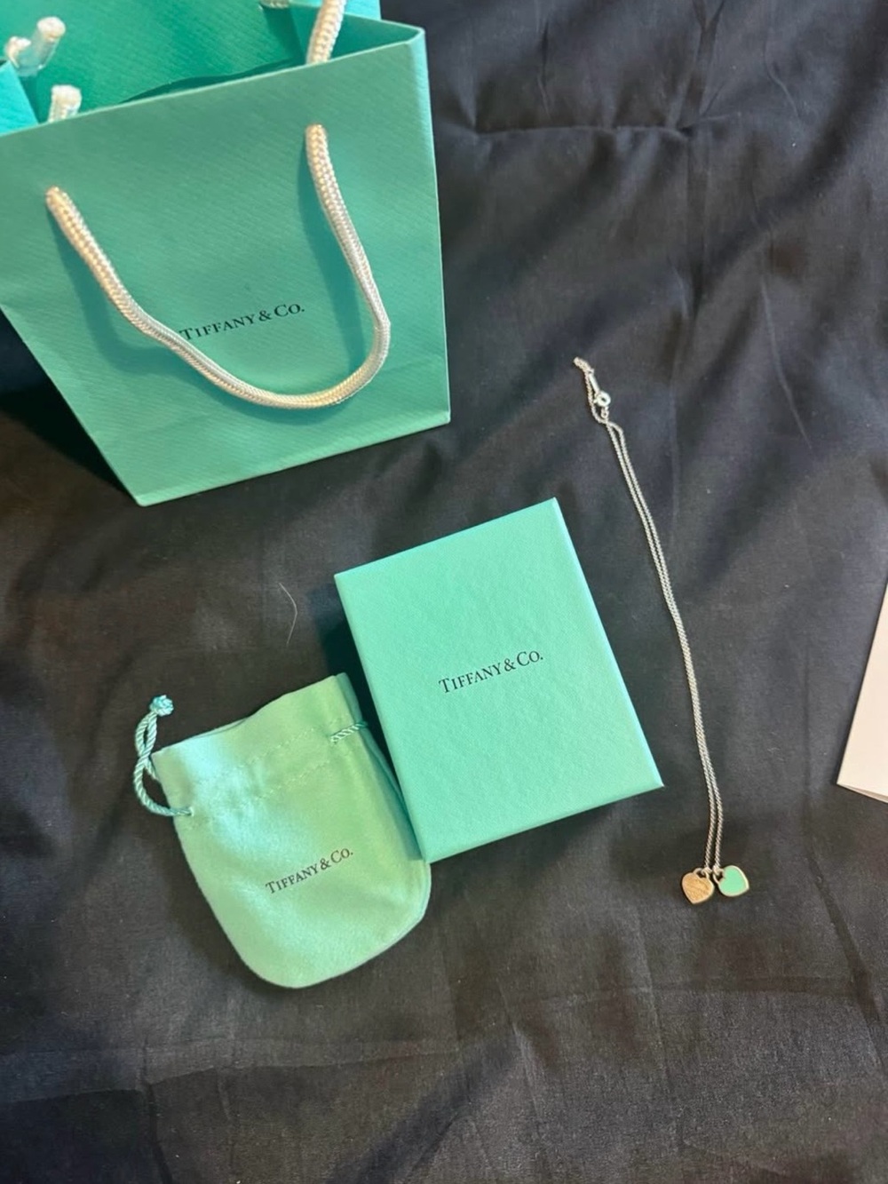 Tiffany & Co. Silver Necklace with Tiffany Blue Heart and Gold Tag